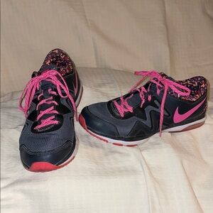 Nike Black and Pink Athletic Shoes with Mesh Upper and Swoosh
